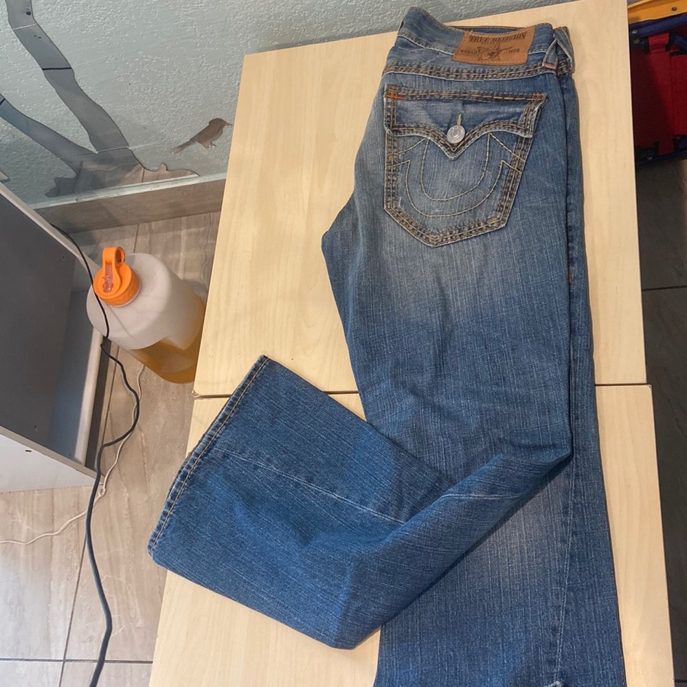 True ReligionJoeySuperT boot cut . Medium wash, light distress detail.36x32